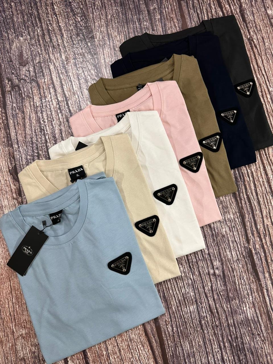 WhatsApp Image 2026-01-18 at 3.56.37 PM (2) M 6 Man's T Shirt (Prada), S-XXL, 48 Pcs Blister - Image 1